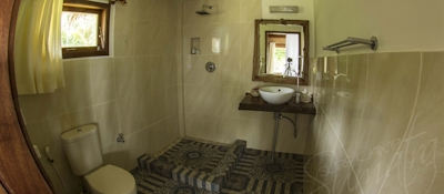 Private bathroom with hot or cold shower, toilet and basin