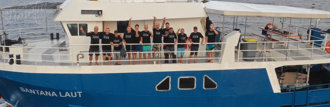 Another group of stoked guests aboard the Santana Laut
